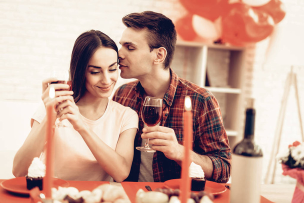 Couple Romantic Dinner At Valentine's Day. Love Each Other. Sweetheart's Holiday Concept. Beautiful Kiss. Feelings Showing. Celebrating Date. Young And Handsome. Happy Relationship. - Фото, изображение