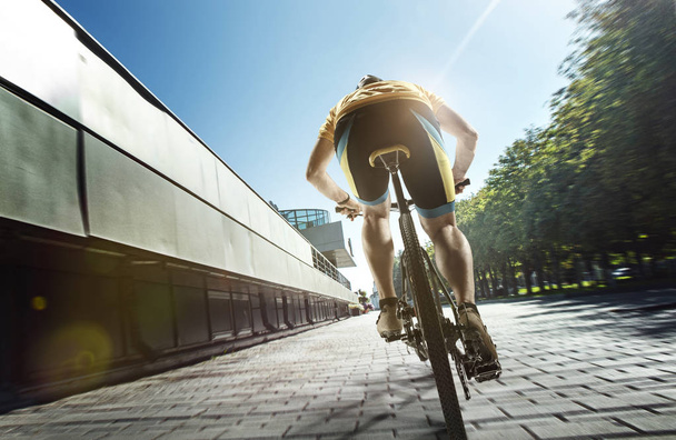 Cyclist portrait on urban day scene - Photo, Image