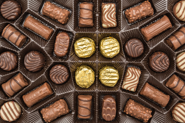 Suklaa karkkia laatikko
 - Valokuva, kuva