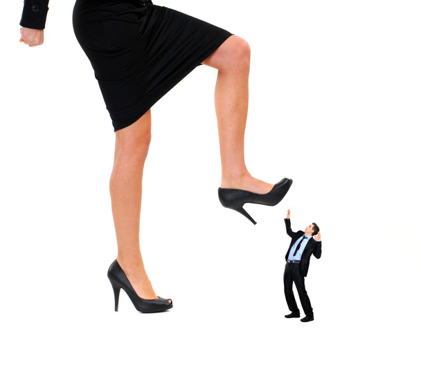 business woman stepping on the boss - Foto, immagini