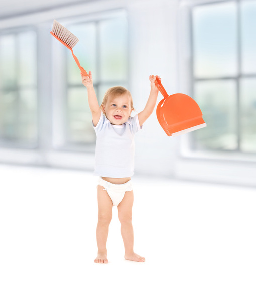 Baby boy with with dustpan and brush - Foto, immagini