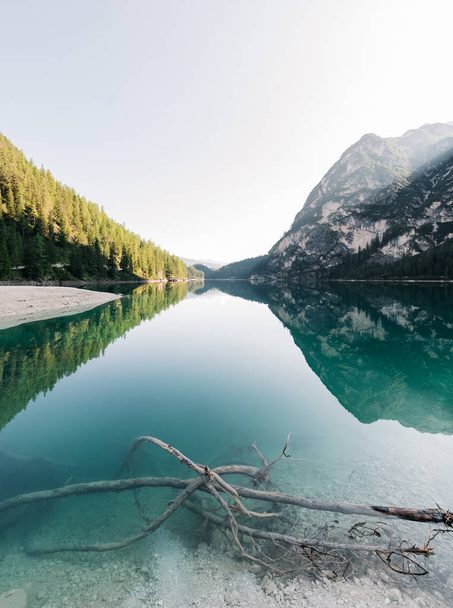 scenic view of fascinating clear lake in mountains, Lago di Braies, Italy - 写真・画像