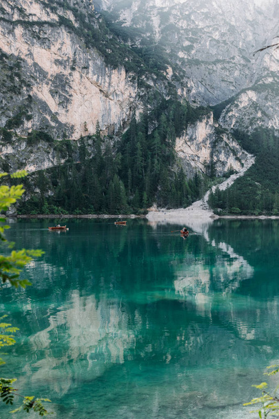 scenic view of fascinating clear lake in mountains, Lago di Braies, Italy - Fotografie, Obrázek