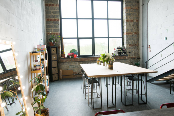 Background shot of modern design apartment with brick walls, copy space - Foto, afbeelding