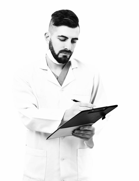 Man with busy and serious face in white coat - Foto, Imagem