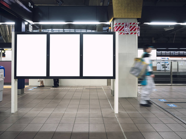 Mock up Blank boards Poster in Train station Platform with People walking  - Photo, Image