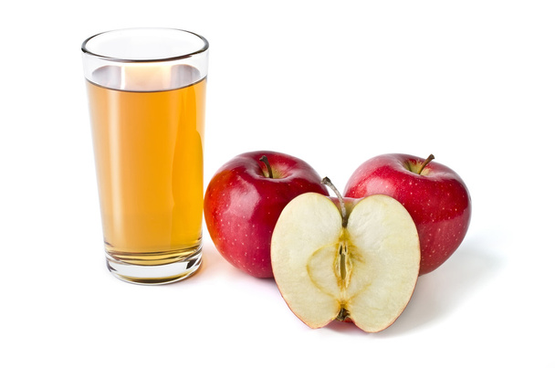 Glass of apple juice and red apples lying next isolated over whi - Foto, immagini