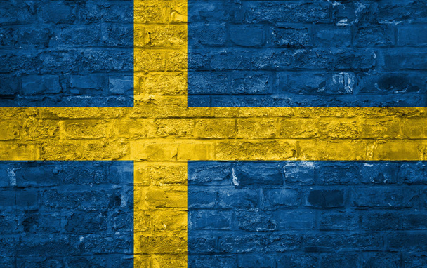背景の上、古いレンガの壁、表面のスウェーデンの国旗 - 写真・画像