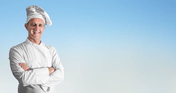 a smiling cook on ligh background - Photo, Image