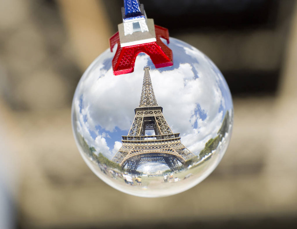 Eiffel Tower, Paris, in a crystal sphere. - Photo, Image