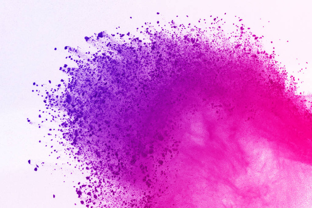 colored powder explosion on white background. Multicolor powder splatted isolate. Colorful cloud. Colored dust explode. Paint Holi. - Photo, image