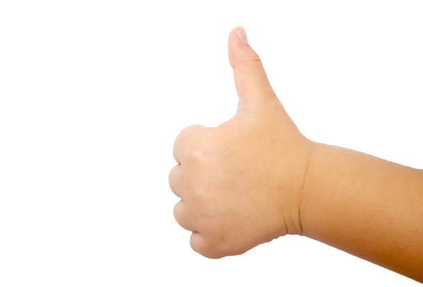 Kid hand with thumb up on white background - 写真・画像