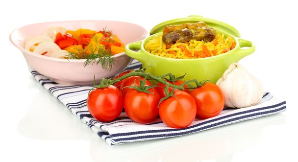 Delicious pilaf with vegetables isolated on white - Foto, imagen