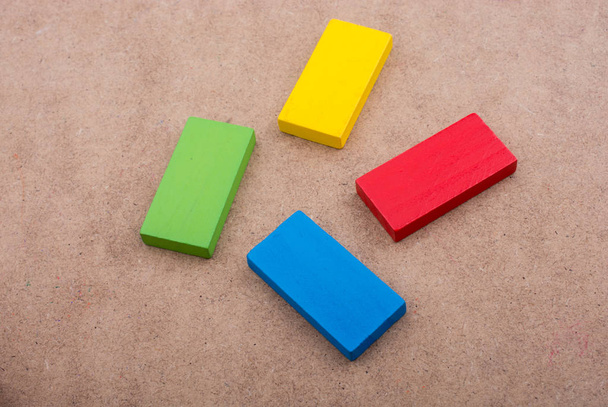 Wooden blocks on a brown background - Photo, Image