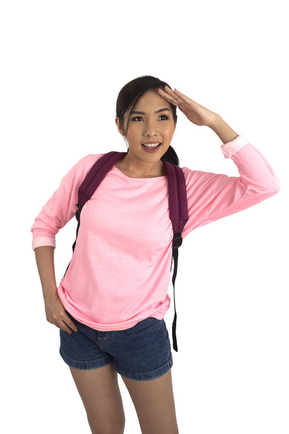 Portrait of beauty asian girl in pink t-shirt and blue jean shorts with backpack looking something. - Foto, immagini
