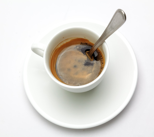 Espresso coffee in white cup and spoon - Фото, зображення