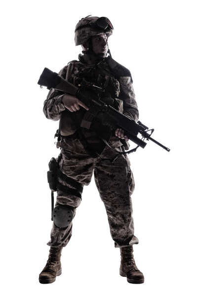 Modern army infantryman low key studio shoot - Photo, Image