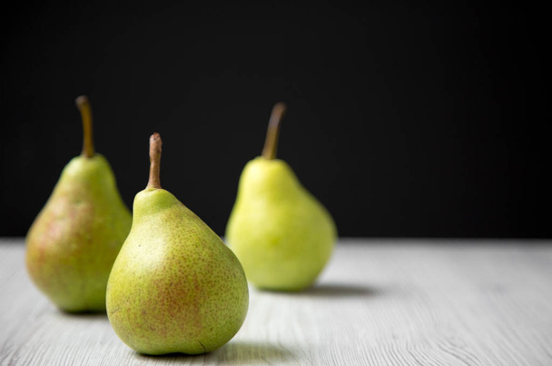 Fresh pears, side view. Copy space. - 写真・画像