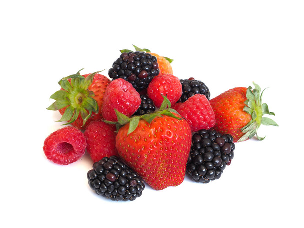 Fresh strawberry, raspberry and blackberry on wooden background, healthy food and diet. - Foto, Bild