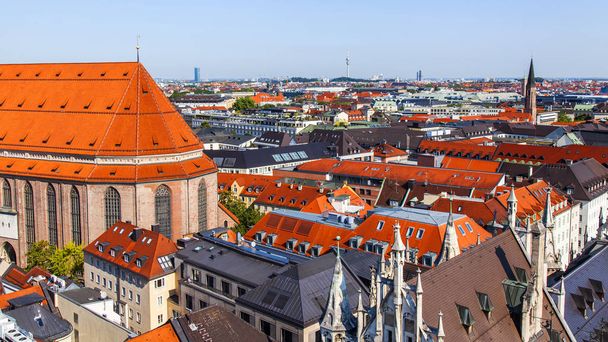 Munich, Germany, on August 16, 2018. A view of Alstadt and city roofs from the survey platform of the New Town hall - Photo, Image