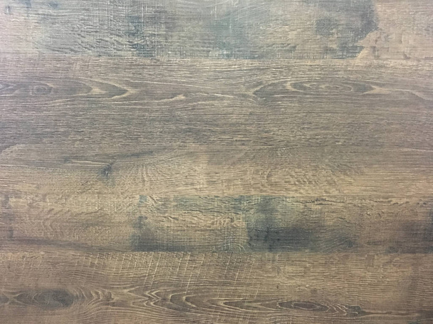 wood brown background texture, dark weathered rustic oak. faded wooden varnished paint showing woodgrain texture. hardwood washed planks background pattern table top view. - Photo, Image
