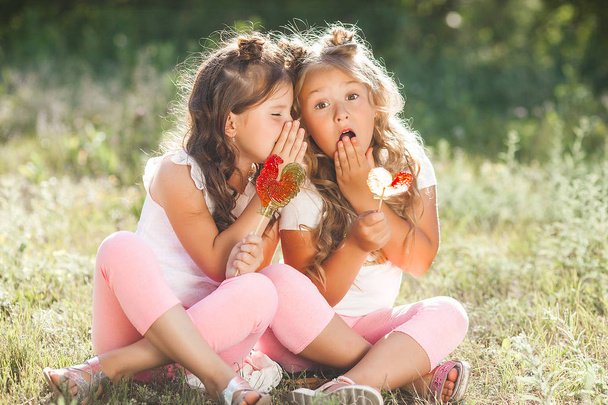 Cute little girls friends having fun together outdoors, - Φωτογραφία, εικόνα