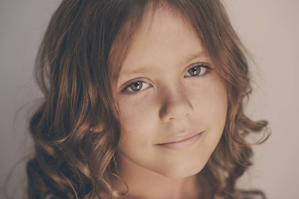 close up portrait of the beautiful little girl  - Фото, изображение