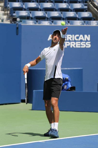 NEW YORK - AUGUST 22, 2018: 13-time Grand Slam champion Novak Djokovic of Serbia practices for the 2018 US Open at Billie Jean King National Tennis  - 写真・画像