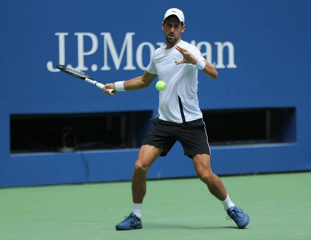 NEW YORK - AUGUST 22, 2018: 13-time Grand Slam champion Novak Djokovic of Serbia practices for the 2018 US Open at Billie Jean King National Tennis  - Photo, Image
