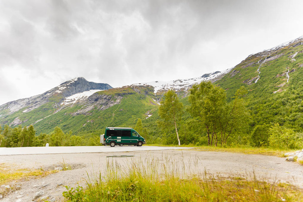 Tourism vacation and travel. Camper van and norwegian mountains landscape - Fotó, kép