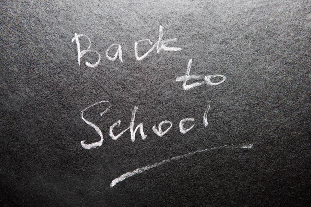Back to school - words on blackboard with chalk - Foto, imagen