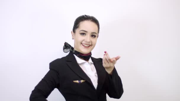 Beautiful stewardess. Studio shot with fly attendant woman. - Footage, Video