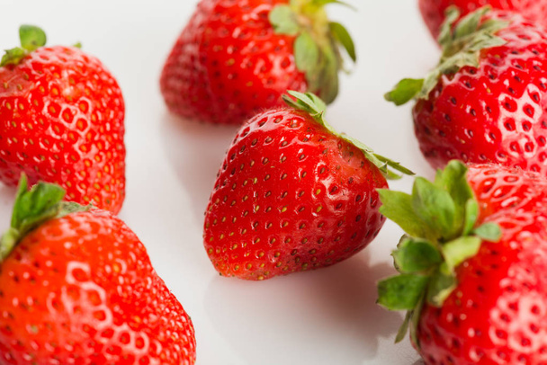 pattern of fresh strawberries on white background  - Fotografie, Obrázek
