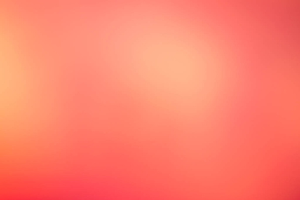 Resumen desenfocado naranja y rojo patrón de luz circular
  - Foto, imagen