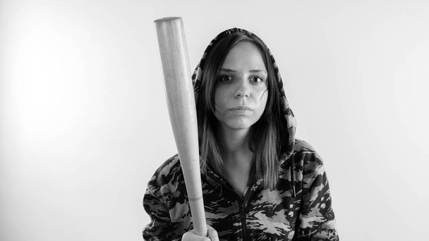 Girl with a bat. girl or criminal woman, pretty girl holding baseball bat isolated on white. Sport and training - Φωτογραφία, εικόνα