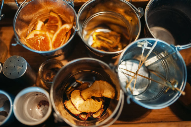 Buckets with beverages closeup, top view. Alcoholic drinks preparation, bartending - Fotó, kép