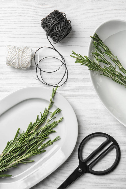 Flat lay composition with rosemary on table. Aromatic herbs - Foto, Imagem