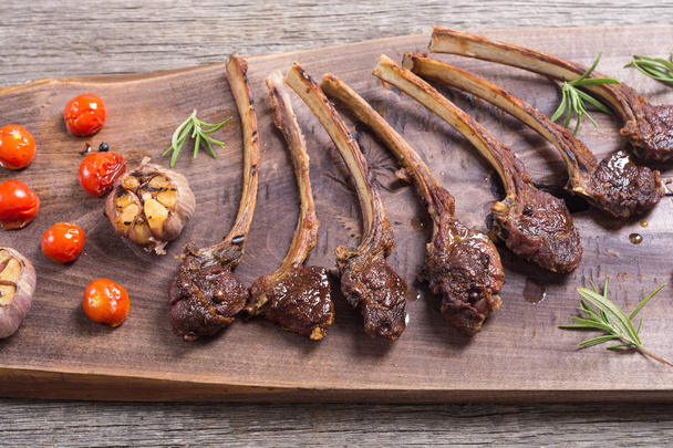 Grilled ribs or rack of lamb and ingridient . Food background - Foto, afbeelding