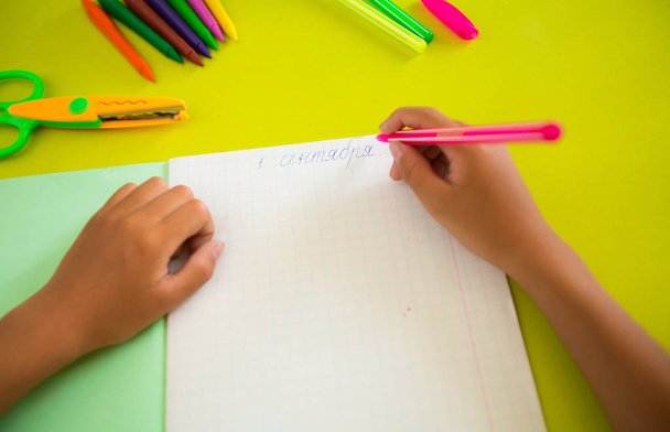 Table student, on the desk notebook, pen, and other school supplies - 写真・画像