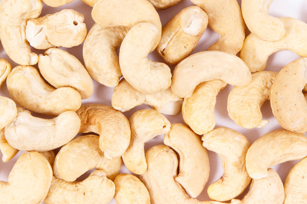 Cashew nuts as fruit containing magnesium, iron, omega 3 acids, unsaturated fats, vitamins and minerals - Foto, Imagen