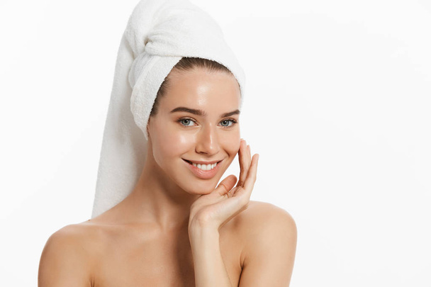 Spa skin care beauty woman wearing hair towel after beauty treatment. Beautiful young woman with perfect skin isolated on white background. - Φωτογραφία, εικόνα