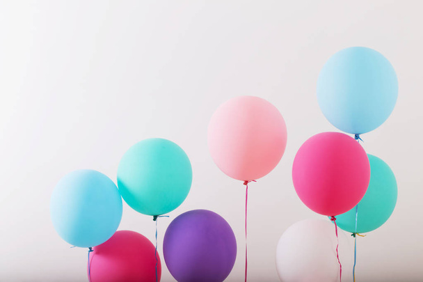 balloons on white wooden background - Foto, imagen