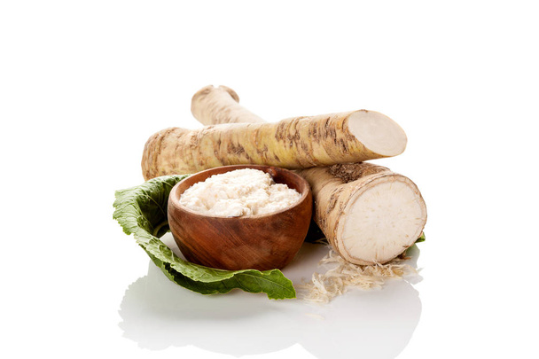 Fresh and grated horseradish roots isolated on white background. - Photo, Image