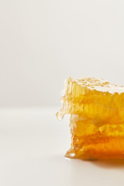 close up view of natural beeswax on white background - Photo, Image