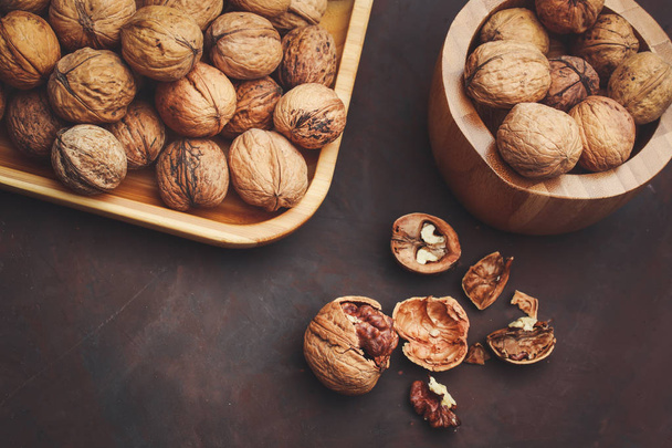 walnuts on a dark background - Φωτογραφία, εικόνα
