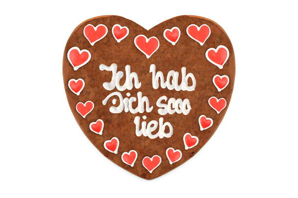Valentines day Gingerbread with german Ich habe Dich so lieb (engl. i like you so much) heart with white isolated background. - Photo, Image