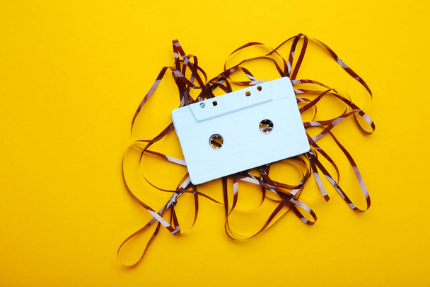 Cassette tape on yellow background - Photo, image