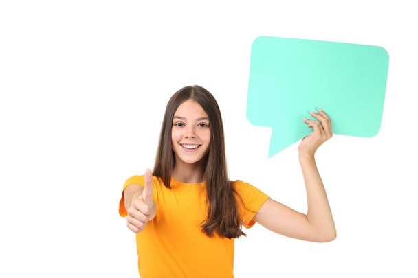 Young girl with speech bubble on white background - Φωτογραφία, εικόνα