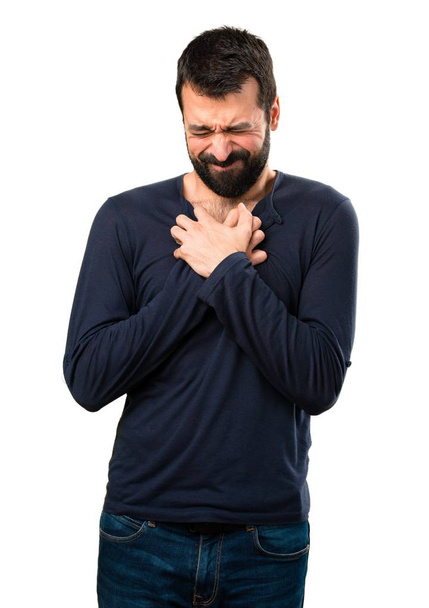Handsome man with beard with heart pain - Foto, Imagen