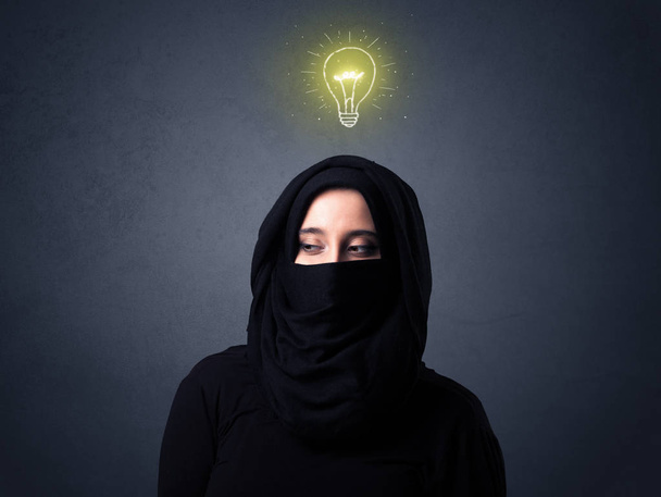 Muslim woman wearing niqab - Фото, изображение